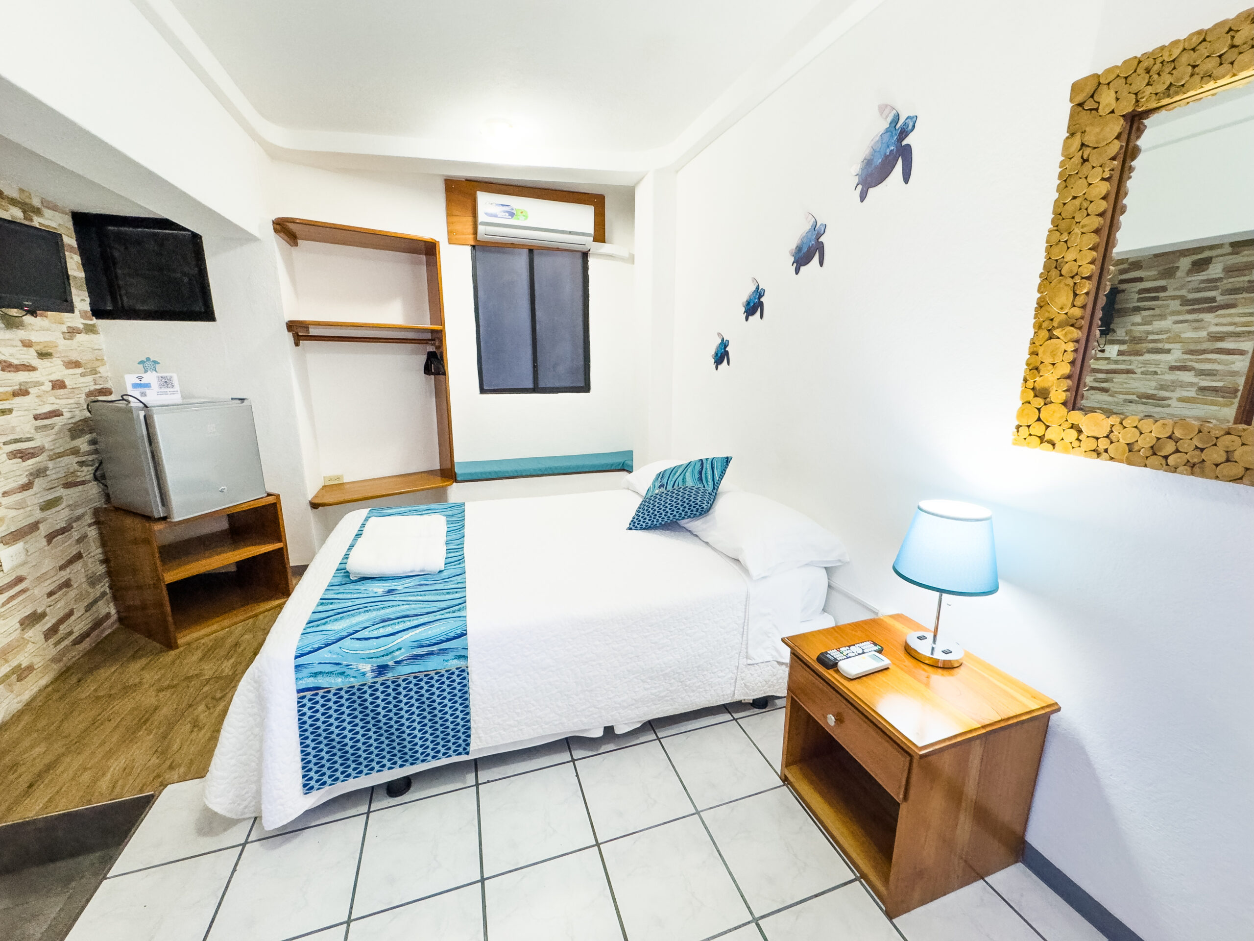 Pinzones Room — cozy with local art