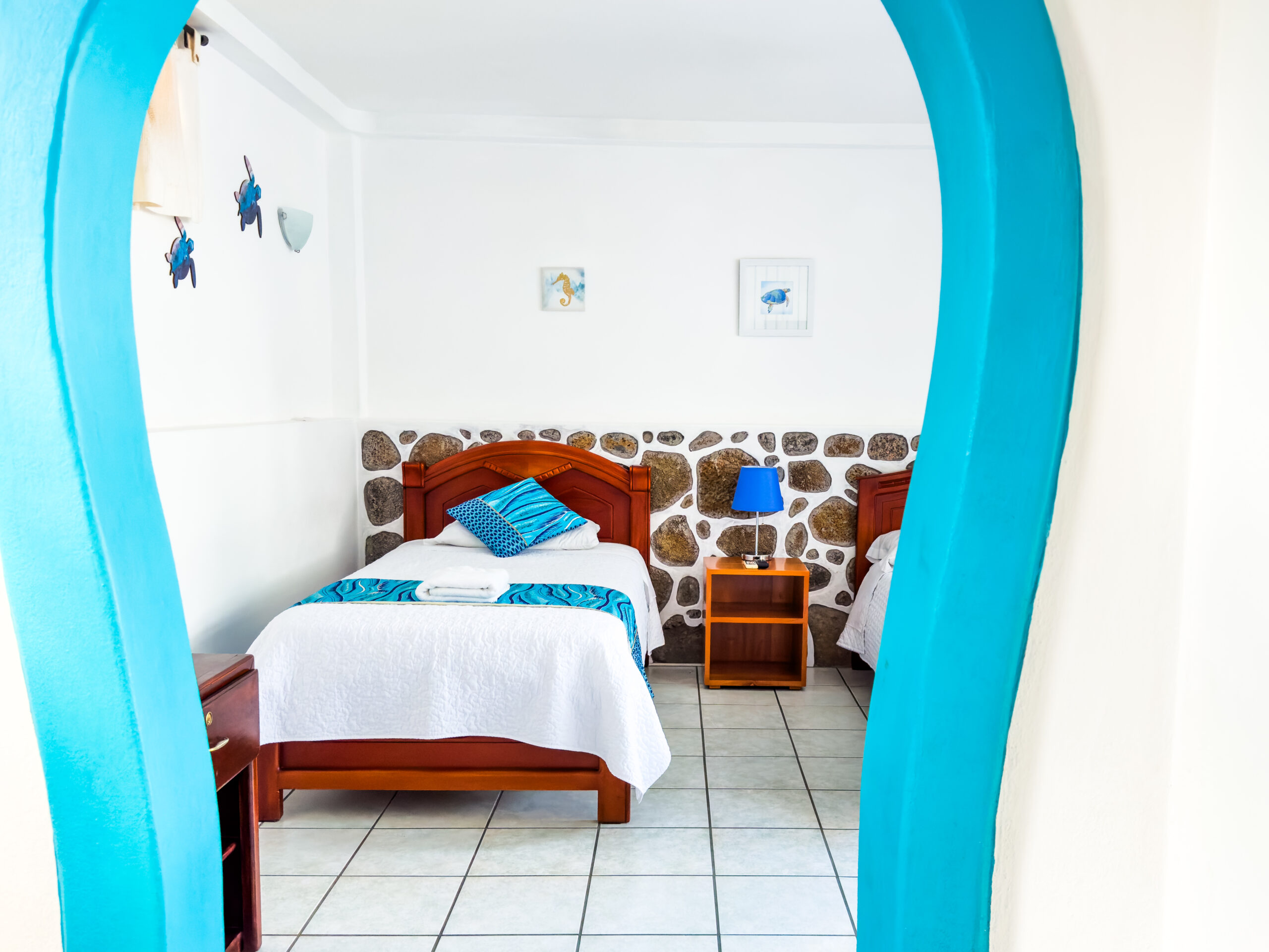 Cucuve Room — bright with wooden furniture