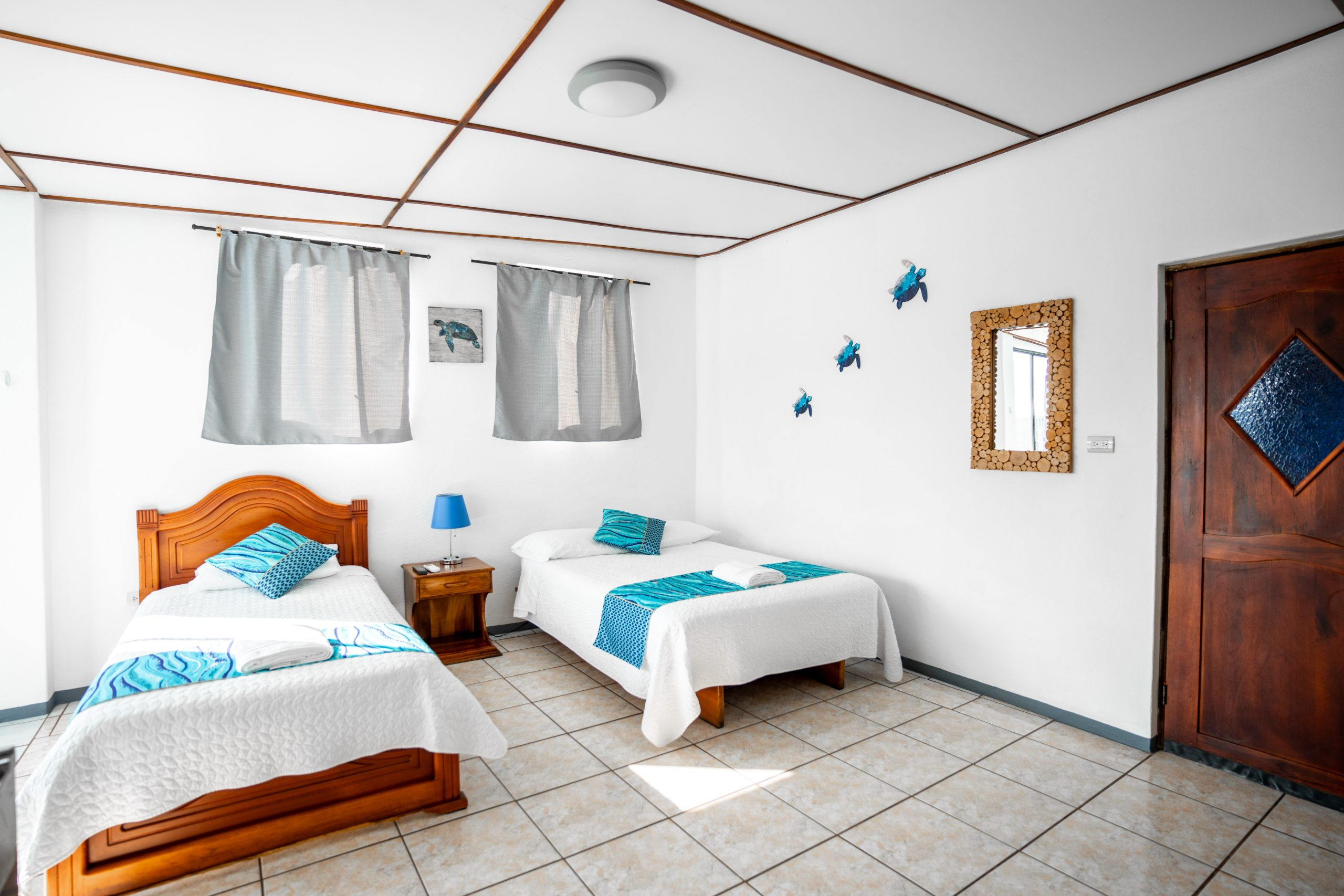 Pelikano Room — warm tones with pelican artwork